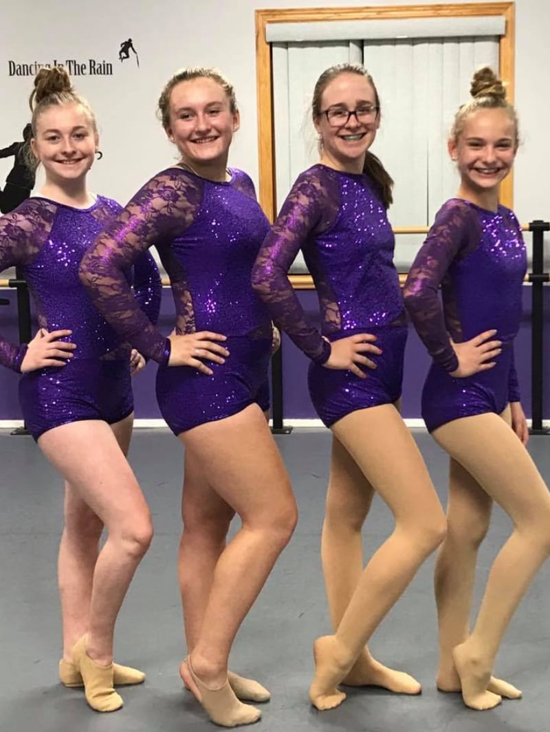 Girls in purple dresses at Bauer Fine Arts Academy
